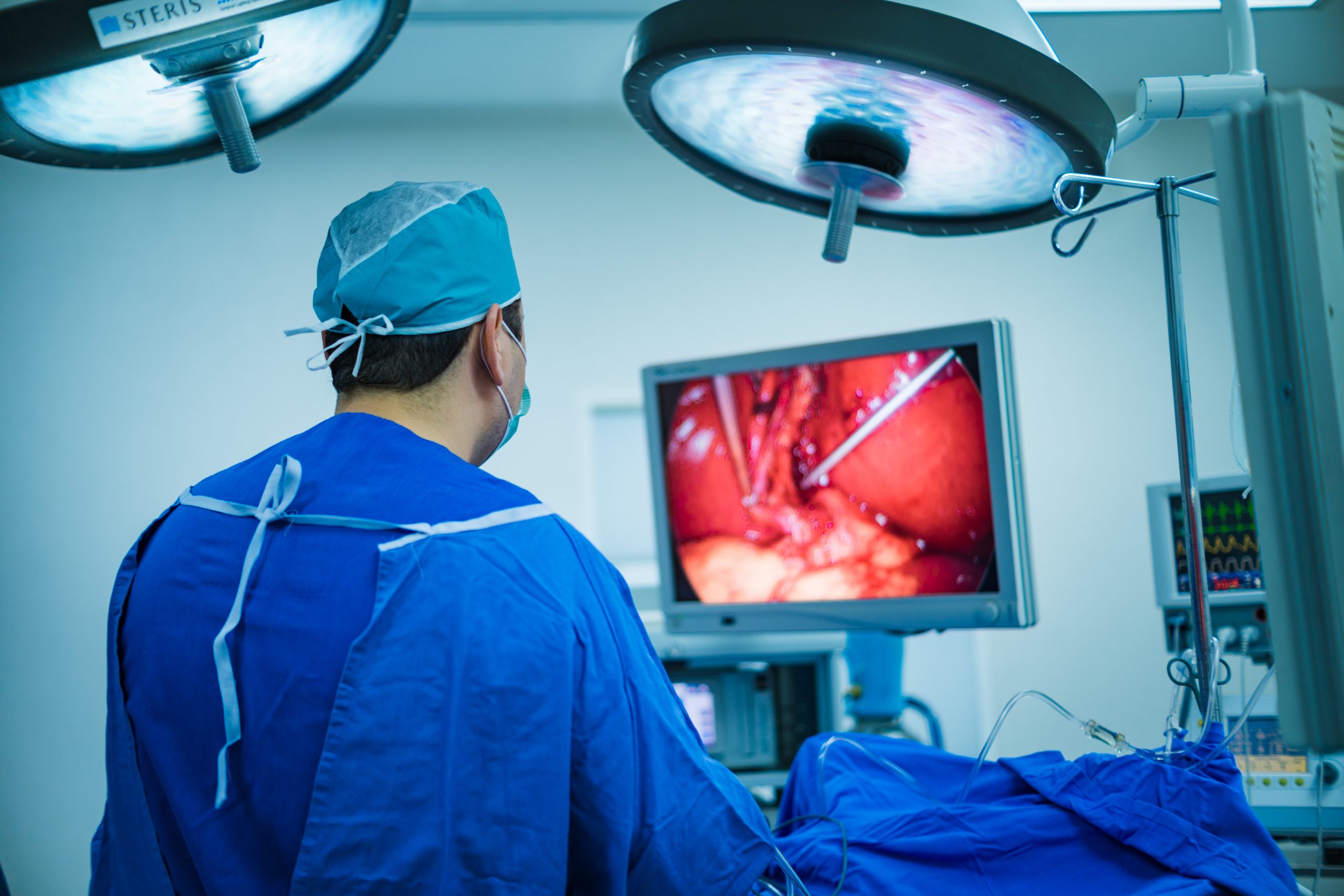 A,Laparoscopic,Surgeon,At,Work,,Performing,A,Minimally,Invasive,Surgery